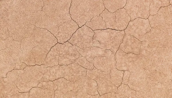 Zemin, kuraklık ve ölüm kavramına sahip arka plan veya grafik tasarımı için üst görünümde çatlaklar var..