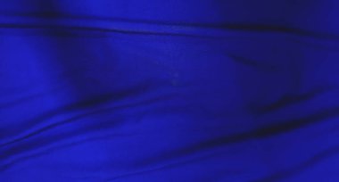 Grafik tasarımı ya da duvar kağıdı için koyu mavi kumaş. Şatafatlı kumaş desenli bulanık kumaş. Klasik tarzda pürüzsüz dalgalarla güzel soyut arkaplan.