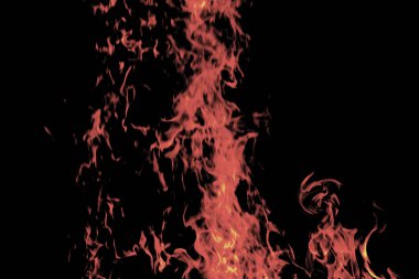 Grafik tasarımı ya da duvar kağıdı için yanan alevleri siyah arkaplanda kapat. Kırmızı ve sarı, ısı enerjisi gece boyunca yakıtı ateşliyor. Yemek pişirmek için kullanılan soyut ateş..