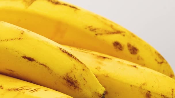 Κίτρινες Μπανάνες Κοντινές Περιστροφή Βίντεο Πλάνα — Αρχείο Βίντεο