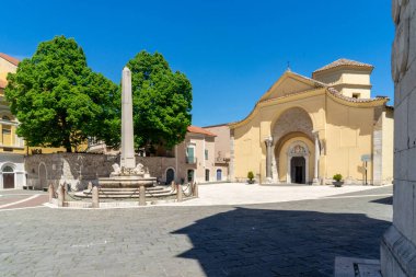 Walking through the historic center of Benevento, Piazza Santa Sofia with the Chiaramonte fountain and Santa Sofia church clipart