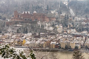 walking through the streets of Heidelberg with snow and river view, path of the philosophers