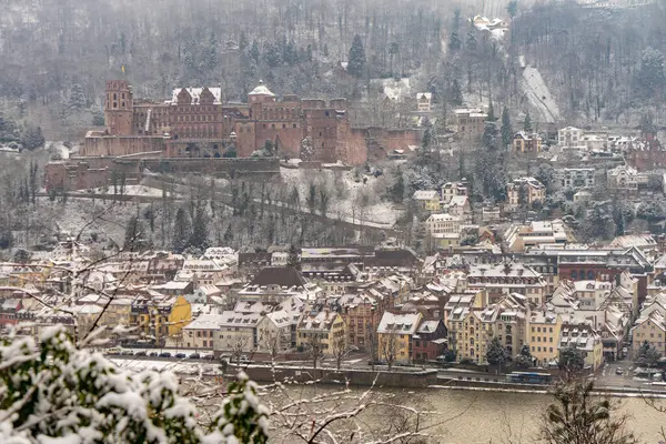 walking through the streets of Heidelberg with snow and river view, path of the philosophers