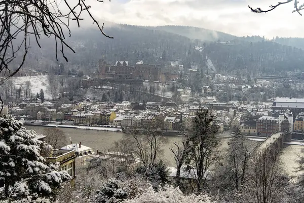 walking through the streets of Heidelberg with snow and river view, path of the philosophers