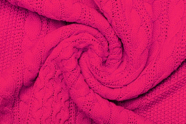 stock image The texture of warm knitted sweater. Beautiful handmade knitted repeating pattern. Demonstrating Pantone color of the year 2023 viva magenta.