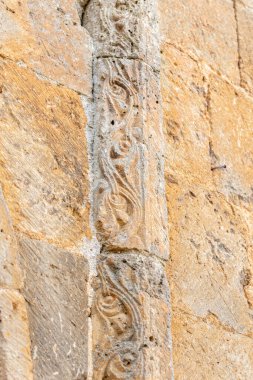 Romanesque details of the church of Nuestra Senora del Castillo in Calatanazor. Soria, Castilla y Leon, Spain. clipart