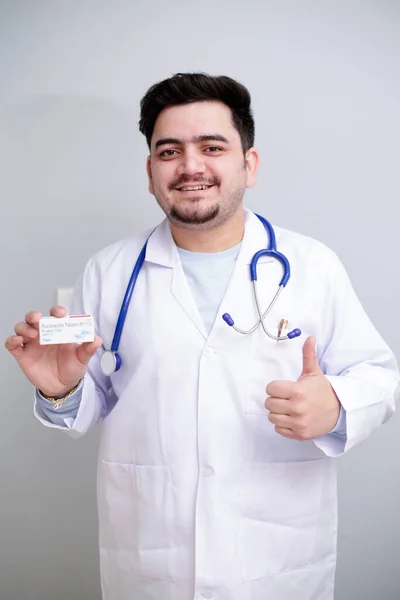 Young Doctor Holding Medicine One Hand Showing Thumbs Sign — Stock Photo, Image