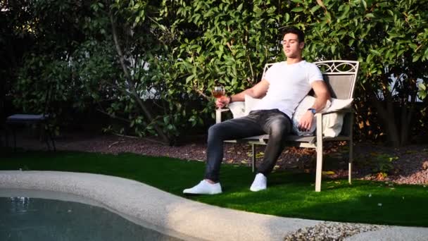 Seductive Handsome Young Man Sitting Drinking Toasting Celebrating Liquor Shot — Stock Video