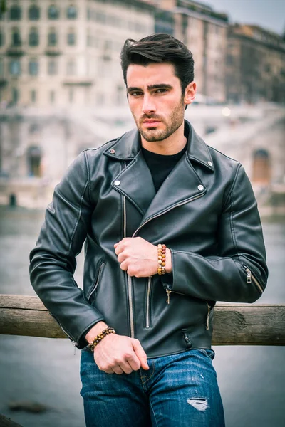 Photo Stylish Man Leaning Fence Leather Jacket Stock Photo