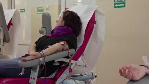 Woman Donating Blood Transfusion Center Focus Hand — Vídeos de Stock