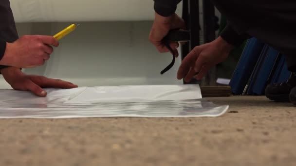 Man Cutting Transparent Foil Warehouse Greenhouse — Stock Video