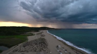 Video with an empty wild beach at sunset. Panoramic sunset video with one of the most beautiful and wild beaches at the Black Sea coast and the estuary of Veleka river, Bulgaria.