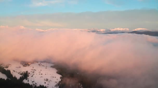 Drone Flight Beautiful Low Clouds Mists Creeping Snow Covered Mountain — Stock video