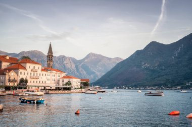 Panoramic view of the picturesque town of Perast in the Bay of Kotor with the promenade, beautiful historic buildings and boats, Montenegro.	