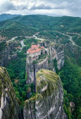 Amazing panoramic view with Varlaam Monastery in the Meteora Valley near Kastraki, Greece.	