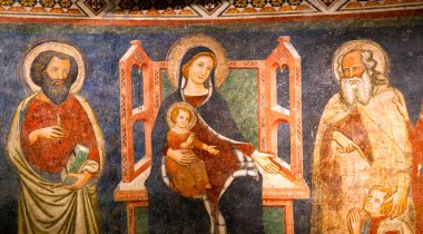 VARALLO SESIA, ITALY - 15 jan 2023: fresco of Madonna with child at the monumental complex of the Sacro Monte of Varallo clipart