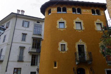 Varallo, Italy - 19 aug 2022: A traditional house in the central square. High quality photo clipart