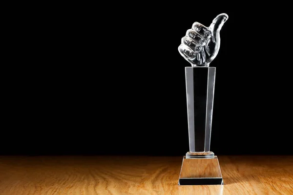 Glass Thumb Trophy Wooden Table — Stock Photo, Image