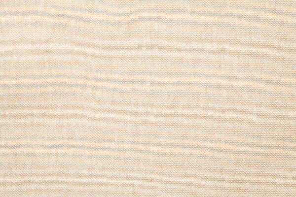 Beige cotton cloth texture background. Close-up.