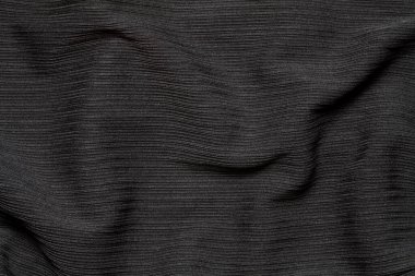Siyah kumaş dokusu arkaplanının yakın plan görüntüsü