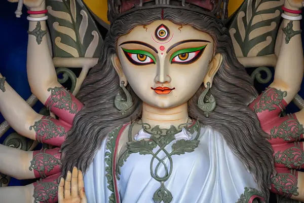 Stock image Idol of Goddess Devi Durga at a decorated puja pandal in Kolkata, West Bengal, India. Durga Puja is a famous and major religious festival of Hinduism that is celebrated throughout the world.