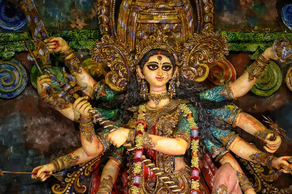 stock image Idol of Goddess Devi Durga at a decorated puja pandal in Kolkata, West Bengal, India on October 21, 2023. Durga Puja is a religious festival of Hinduism that is celebrated across the globe.