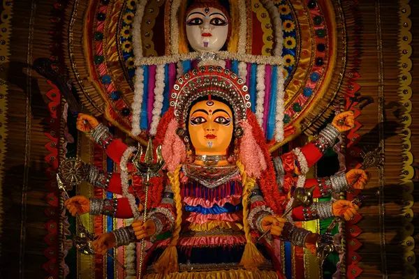 stock image Idol of Goddess Devi Durga at a decorated puja pandal in Kolkata, West Bengal, India on October 19, 2023. Durga Puja is a major religious festival of Hinduism that is celebrated globally.