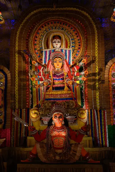 stock image Idol of Goddess Devi Durga at a decorated puja pandal in Kolkata, West Bengal, India on October 19, 2023. Durga Puja is a major religious festival of Hinduism that is celebrated globally.