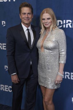 Beverly Hills, CA USA - March 10, 2024: Rob Lowe, Sheryl Berkoff attends DIRECTV Streaming with the Stars. clipart