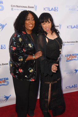 Hollywood, CA USA - June 22, 2024: Loni Love, Jackee Harry attends the Project Angel Food Lead with Love Five Year Anniversary Special. clipart