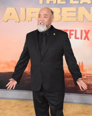 Hollywood, CA USA - February 15, 2024: Paul Sun-Hyung Lee attends the premiere of Netflix's Avatar The Last Airbender. clipart