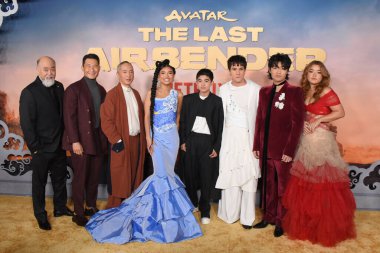 Hollywood, CA USA - February 15, 2024: Paul Sun-Hyung Lee, Daniel Dae Kim, Ken Leung, Kiawentiio Tarbell, Gordon Cormier, Ian Ousley, Dallas Liu, Elizabeth Yu attends the premiere of Netflix's Avatar The Last Airbender. clipart