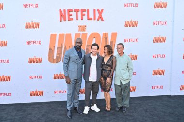 Hollywood, CA USA - August 12, 2024: Mike Colter, Mark Wahlberg, Halle Berry, Julian Farino attends the premiere of Netflix's The Union. clipart