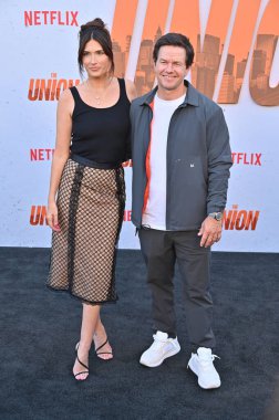 Hollywood, CA USA - August 12, 2024: Rhea Durham, Mark Wahlberg attends the premiere of Netflix's The Union. clipart