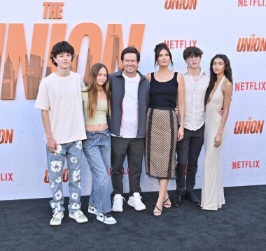 Hollywood, CA USA - August 12, 2024: Rhea Durham, Mark Wahlberg attends the premiere of Netflix's The Union. clipart