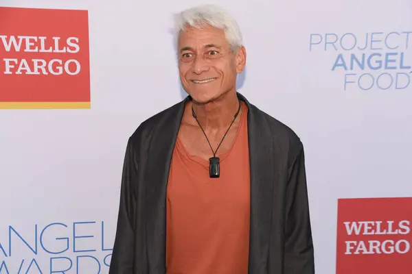 stock image Los Angeles, CA USA - September 23, 2023: Greg Louganis attends Project Angel Food's Angel Awards.