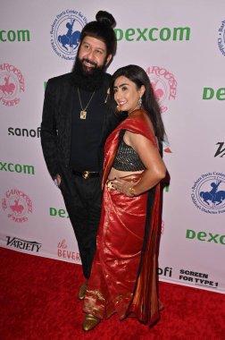 Beverly Hills, CA USA - 5 Ekim 2024: Mickey Popat, Vicky Popat 2024 Umut Atlıkarıncalı Balosu 'na katıldı.