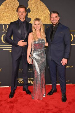 Hollywood, CA USA - February 7, 2025: Cameron Mathison, Candace Cameron Bure, Jesse Hutch attends 32nd Annual Movieguide Faith and Values Awards clipart