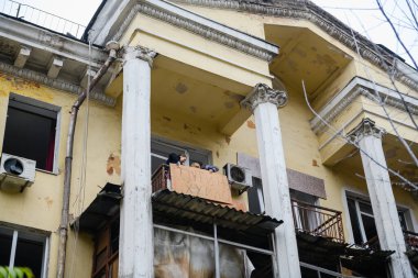 Dnipro, Ukraine Nov 17, 2022: Residents of a house that suffered from a missile attack hung the inscription Putin is fucked up