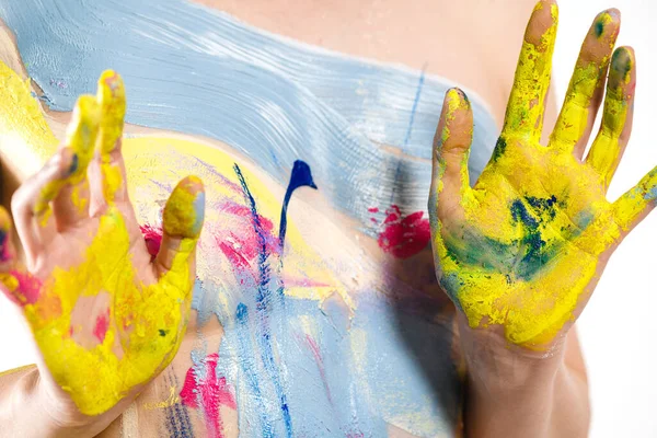 stock image Close-up of female palms painted with paint. Background of the painted body. Body art.