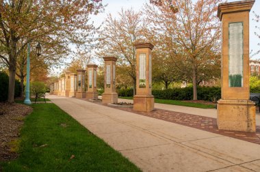 East Lansing MI - May 16 2023: Row of posts at MSU showing the Michigan State University patrons. High quality photo clipart