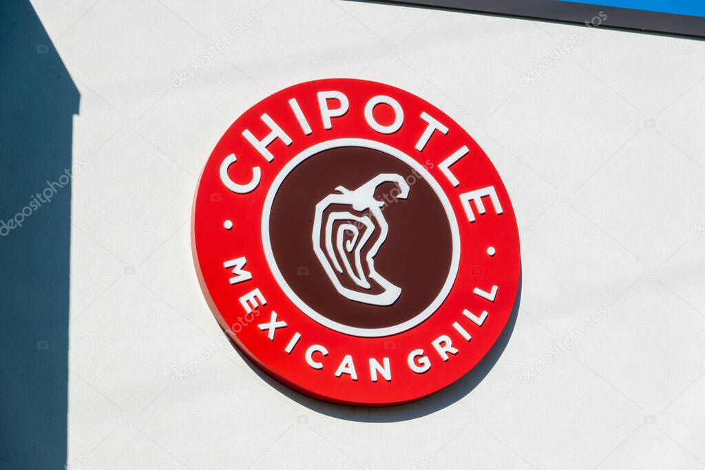 East Lansing, MI - August 31, 2024: Chipotle Mexican Grill Logo on Building. High quality photo
