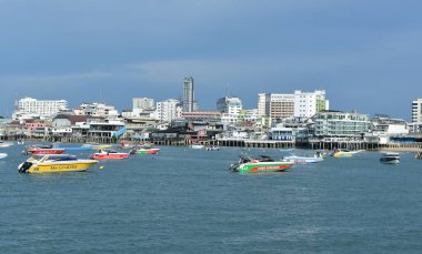 Pattaya Pier has tourists And many speed boats are parked..It is a tourist attraction in Pattaya. Recorded on April 20, 2022 at Pattaya Pier, Thailand.	