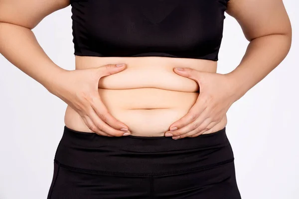 白い背景の太った女性の腹部表面 — ストック写真