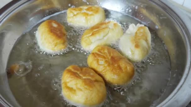 Small Homemade Pies Fried Boiling Oil — Stock Video