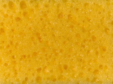 Gözenekli sarı bir süngerin yakın çekimi...