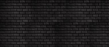 Abstract panorama of black brick wall texture for pattern background. Basic dark background concept.