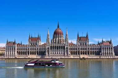 Budapest, Hungary - July 04, 2022: View of Hungarian Parliament Building, Royal Palace and Danube river. clipart