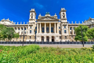 Budapest, Hungary - July 04, 2022: Opposite the Parliament building, the Palace of Justice is one of the most beautiful buildings on Kossuth Square.