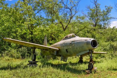 Old aircraft close up on grass clipart